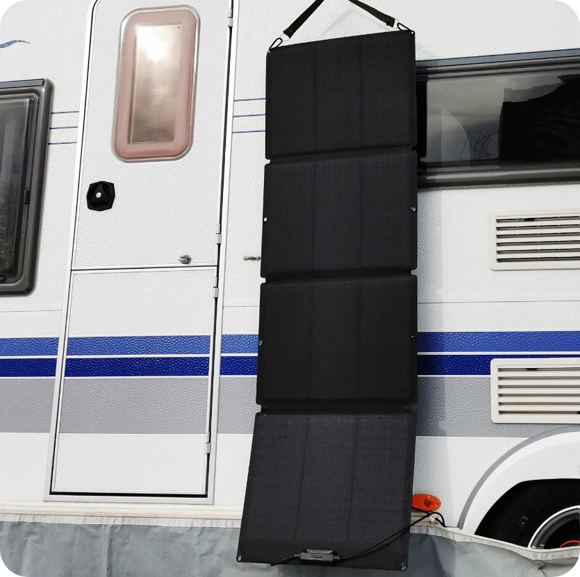 EcoFlow DELTA 2 Portable Power Station 1024Wh + One 110W Solar Panel mounted on an RV for easy charging.