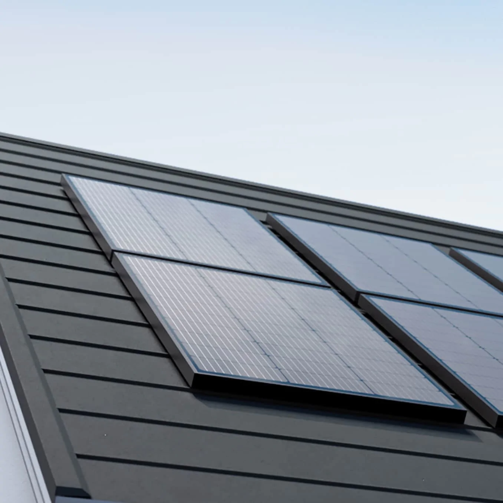 EcoFlow 100W Rigid Solar Panel 2 feet High Efficiency All Black IP68 Waterproof installed on a modern rooftop.