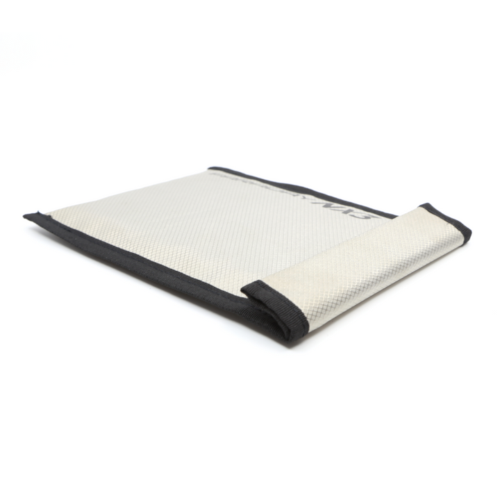 Faraday NX3 cellphone forensic bag with triple-layer CYBER fabric for ESD/EMP protection, shown in white with a black Velcro closure.