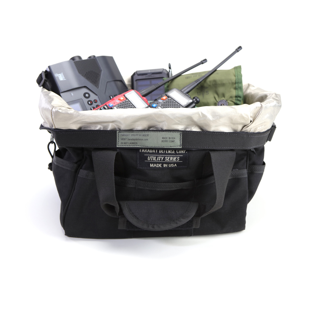 Faraday Cordura Utility Bag Small holding various equipment, durable black canvas construction, waterproof.