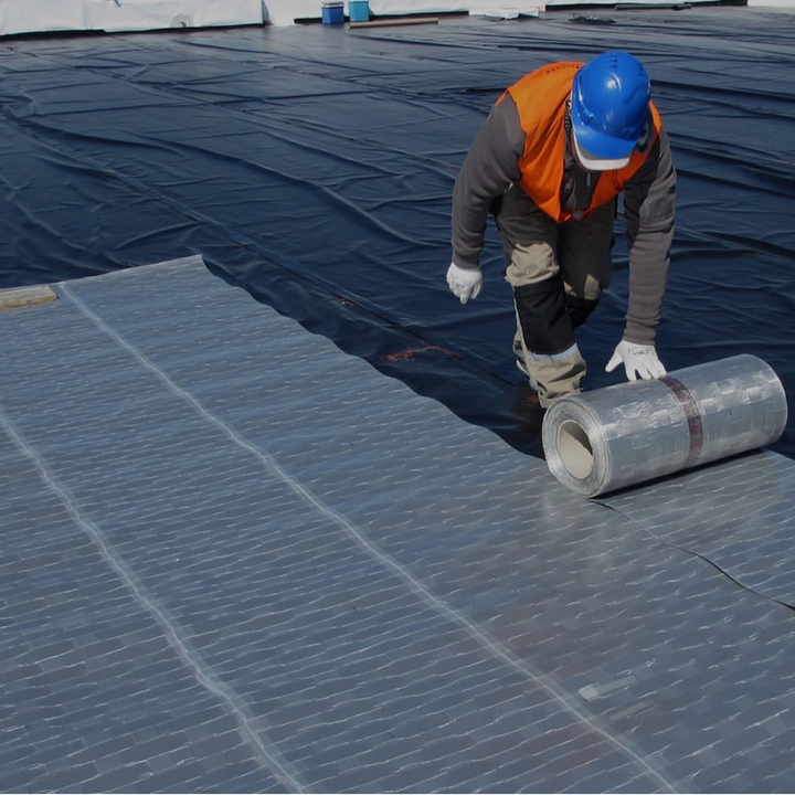 Faraday Cyber FX Low Frequency Barrier installation process on a construction site, demonstrating EMF shielding application.