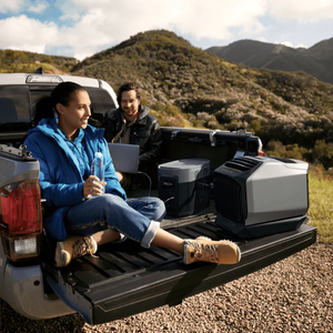 EcoFlow WAVE 2 Air Conditioner and DELTA 2 Portable Generator on truck bed in outdoor setting.