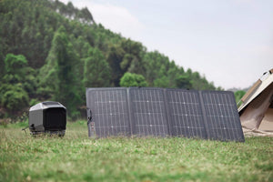 EcoFlow WAVE 2 Portable Air Conditioner with solar panels in outdoor setting.