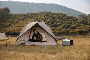 EcoFlow WAVE 2 Portable Air Conditioner heating a tent outdoors.