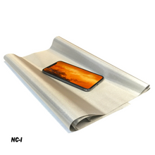 Load image into Gallery viewer, Faraday Cyber NC Fabric EMF RF Shielding Nickel Copper Fabric Roll with phone on top.
