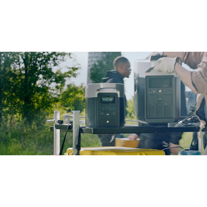 EcoFlow DELTA Max 2000 Power Station with solar panel setup outdoors, showcasing portable power solution.